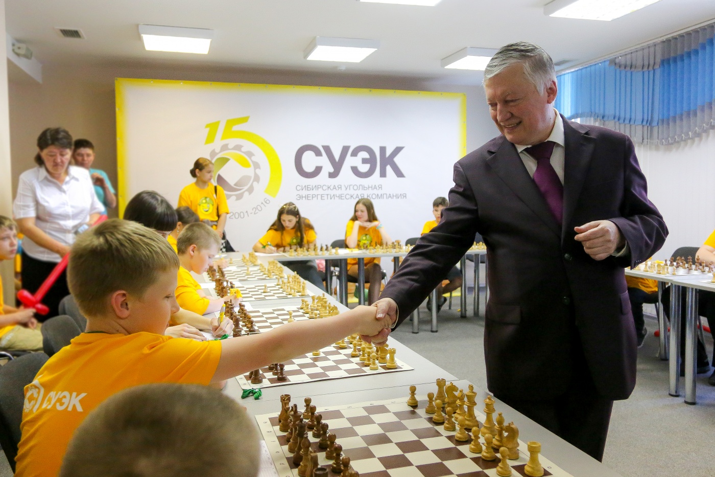 en medium krasnoyarsk suek s chess hopes interregional chess tournament with the world champion anatoly karpov regional development 